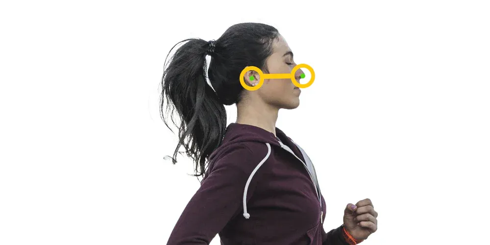 Side view of a runner's head with a level ear-to-nose line, showing a relaxed head position looking straight ahead