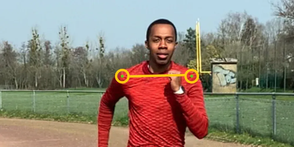 Front view of a runner with a line joining both shoulders, checking that they stay low and relaxed